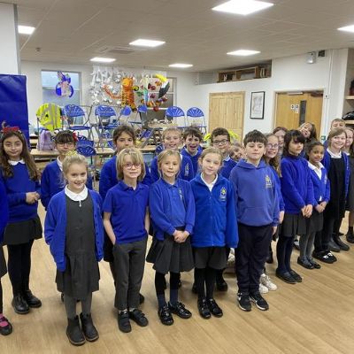 Year 3 and 4 choir practising for their Christmas performances